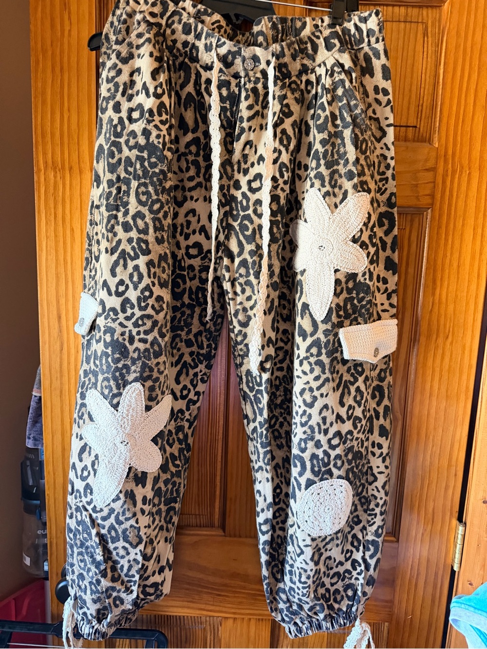 NWOT POL Leopard Print Jogger Pants with Cream Crochet Appliqués